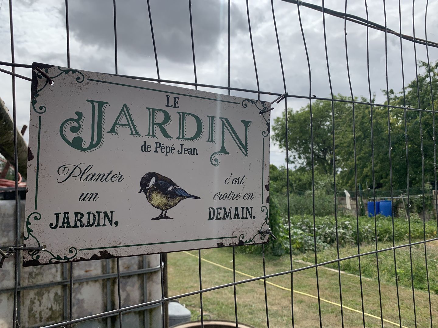 Customer photo review of Joie dans le jardin - Plaque de porte personnalisée
