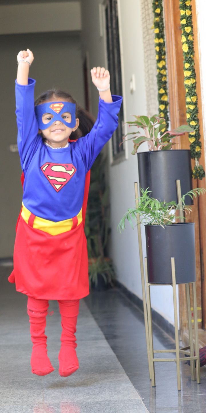 Customer photo review of Supergirl Dress with Cape and Stocking