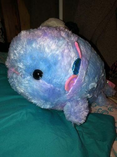 Customer photo review of Fuzzy Galaxy Axolotl