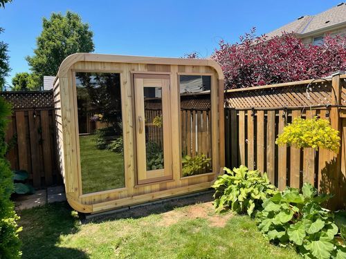 Customer photo review of SAUNASNET Outdoor Square Wood Sauna Room