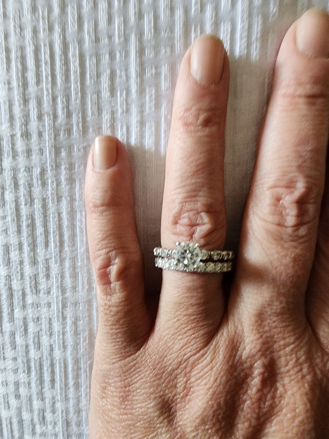 Customer photo review of Pave Moissanite Eternity Wedding Band Ring In Sterling Silver