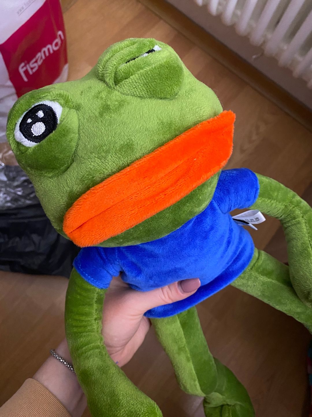 Customer photo review of Pepe The Frog Plushie 18" Sad Frog Meme Soft Stuffed Poseable Plush Toy: Hilarious Cuddle Buddy Meme Doll The Perfect Gift