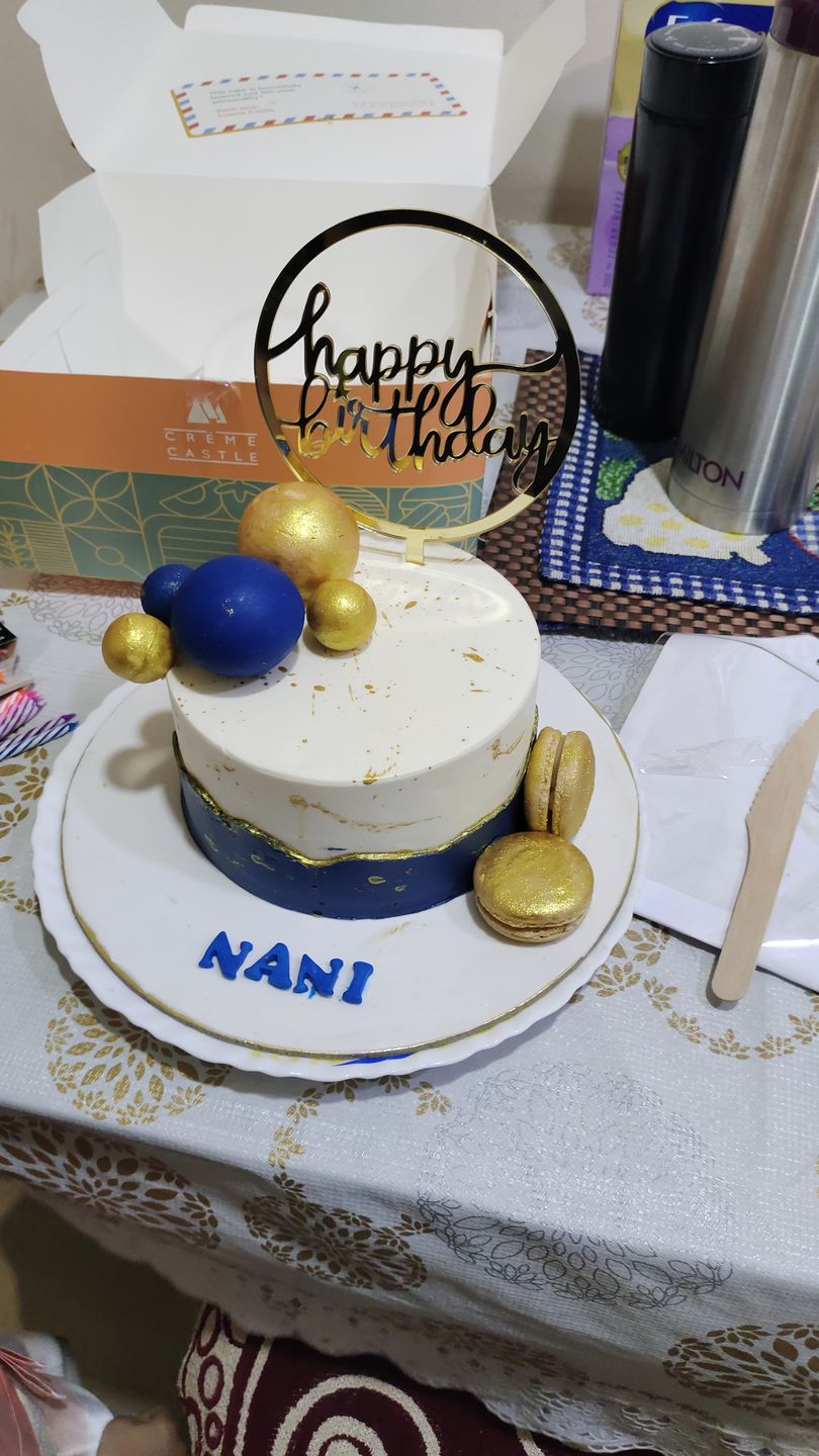 Customer photo review of Gold Splash Blue Cake
