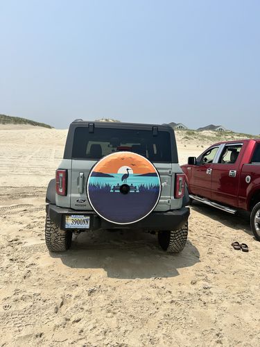 Customer photo review of Sitting on the Dock Coastal Spare Tire Cover for Jeep, RV, Camper, Bronco