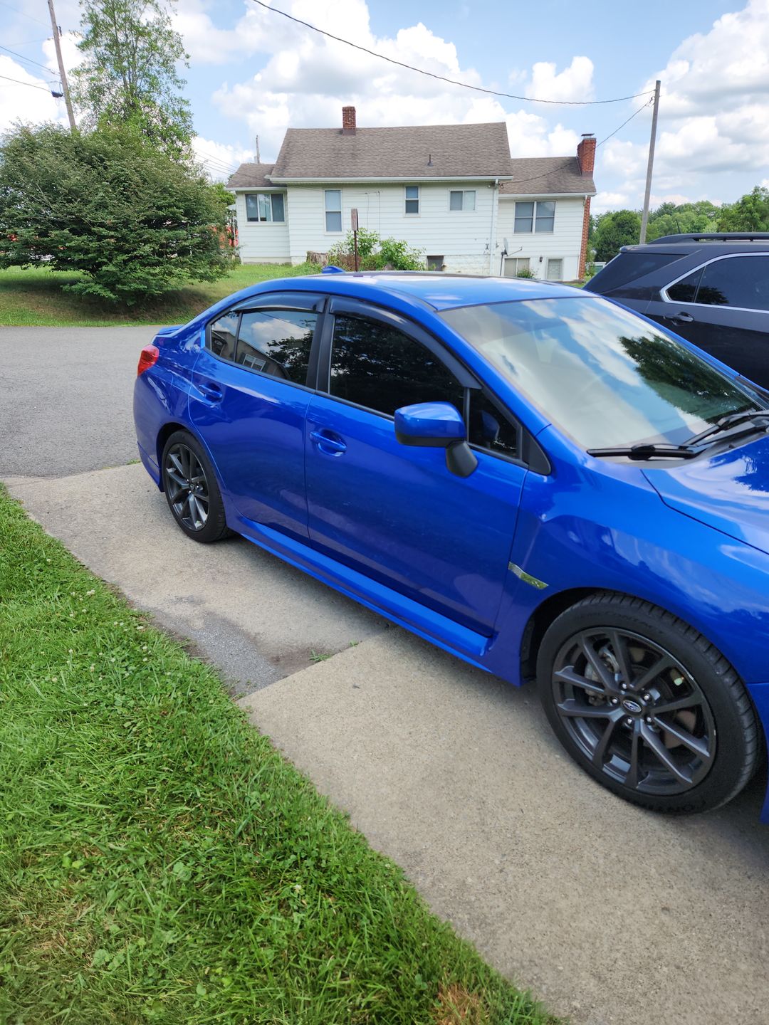 Customer photo review of Window Visors Sun/Rain Guards