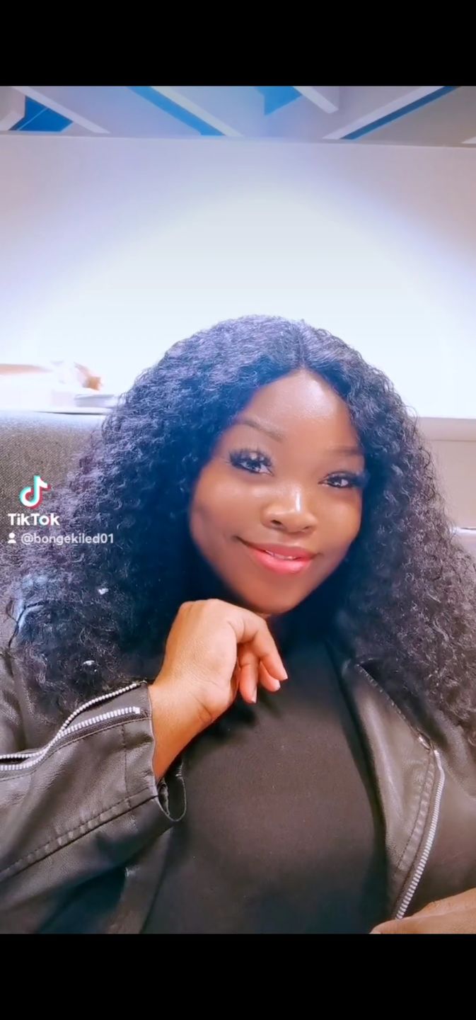 Customer photo review of Gorgeous 20-inch Malaysian Long Curly Wig with Lace Closure - Premium Human Hair