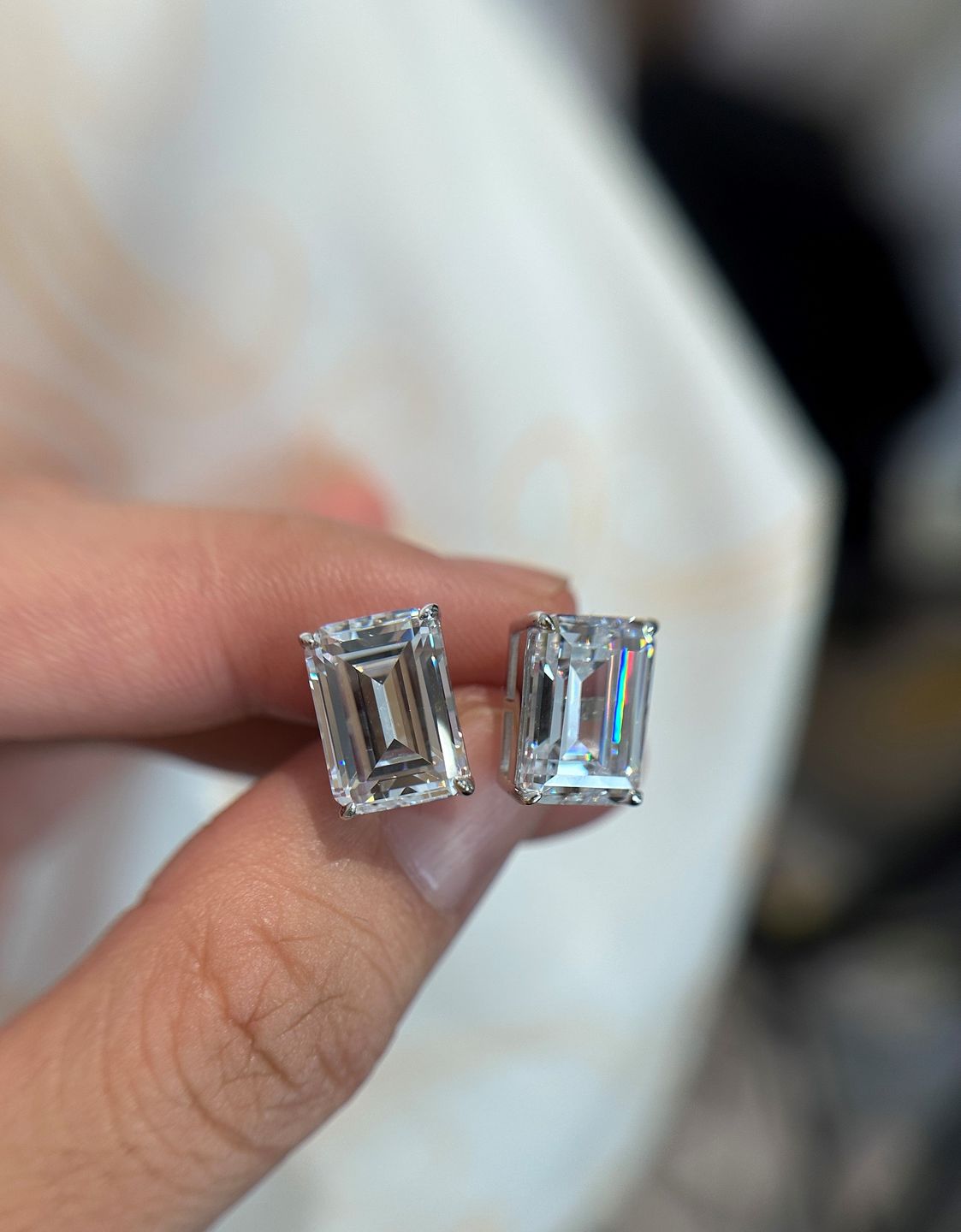 Customer photo review of Louily 4.5 Ct Classic Emerald Cut Women's Stud Earrings In Sterling Silver