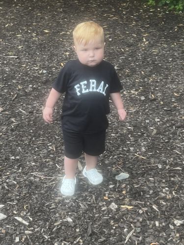 Customer photo review of FERAL College Kids Tee