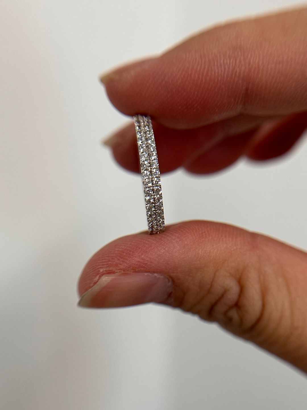 Customer photo review of Louily White Gold Double Halo Round Cut Women's Wedding Band In Sterling Silver