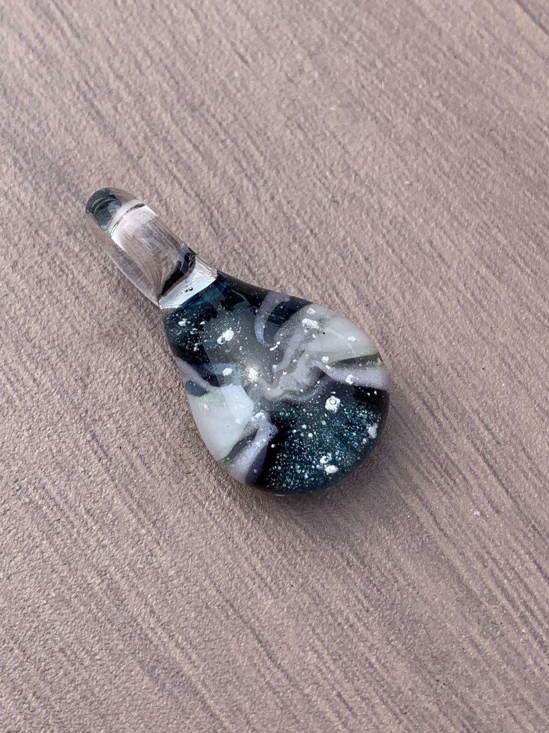 Customer photo review of Ocean Crash Pendant with Infused Cremation Ashes