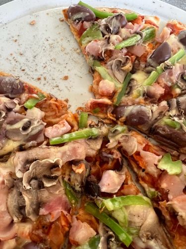 Customer photo review of Frozen Artisanal Wood Fired Pizza Bases 5X150G | Available in CPT & Gauteng Only
