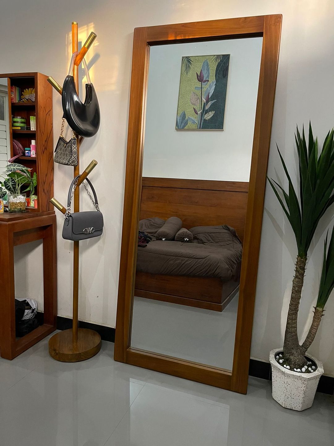 Customer photo review of Minimalist Teak Coat Rack – Branch Design