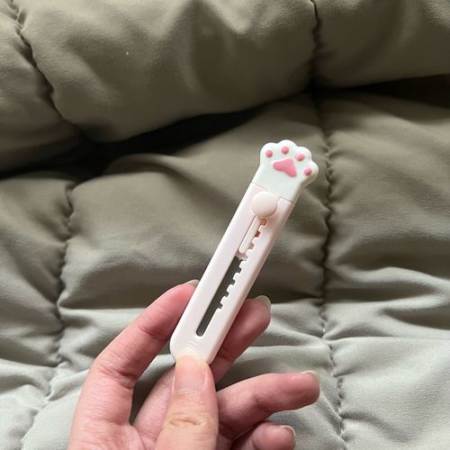 Customer photo review of Cat Paw Paper Cutter