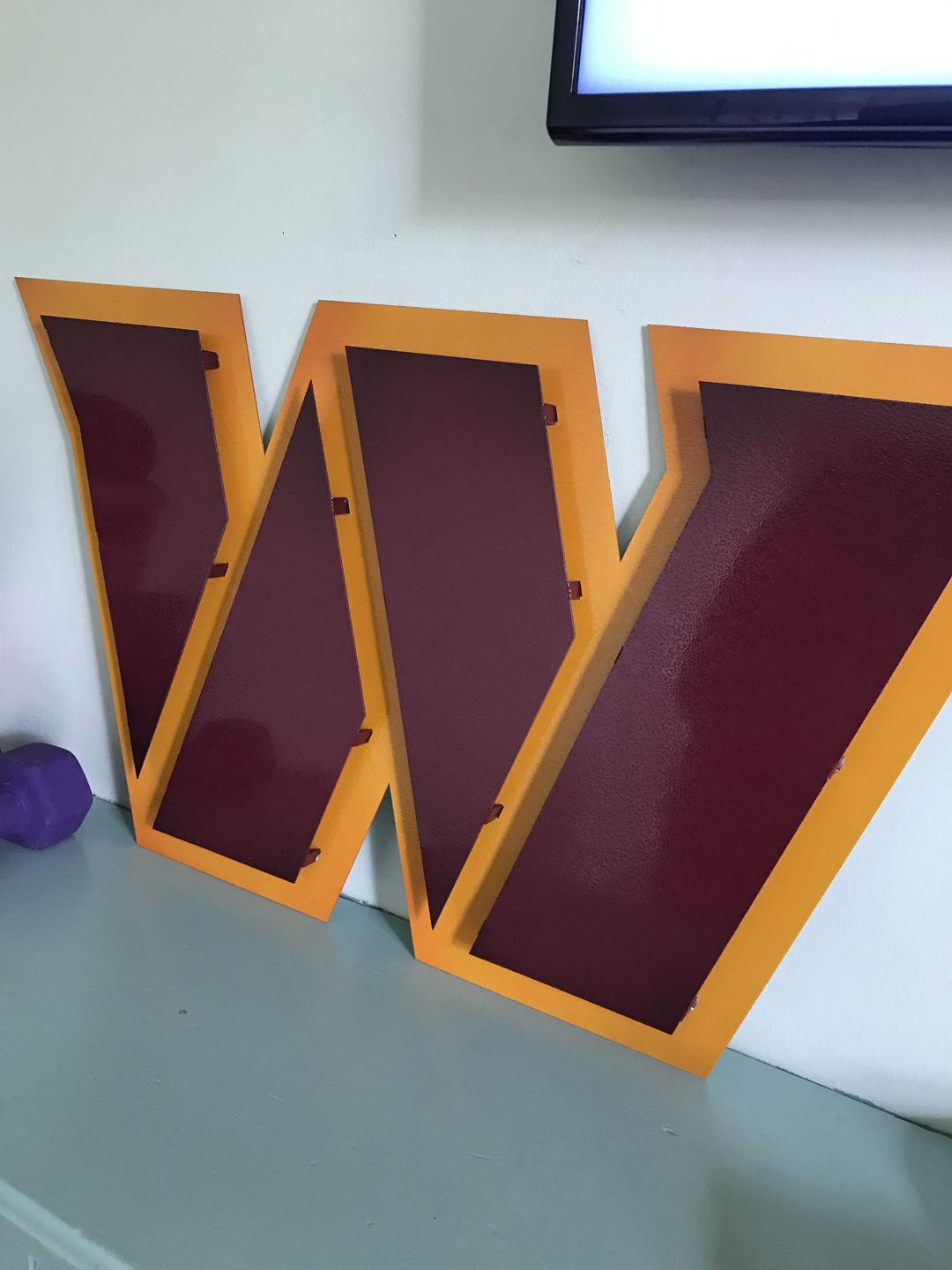 Customer photo review of Washington Commanders "POWER W" 3D Vintage Metal Wall Art