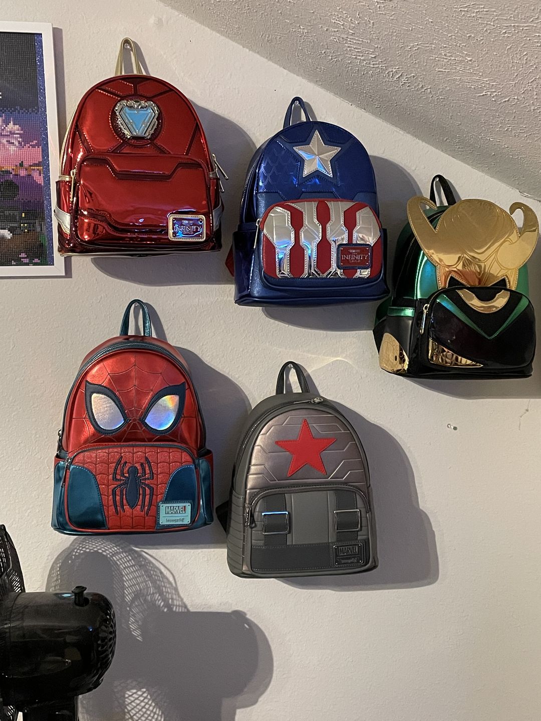 Customer photo review of Loungefly Marvel Winter Soldier Cosplay Mini Backpack