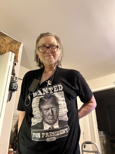 Customer photo review of Following Biden's Instructions T-Shirt