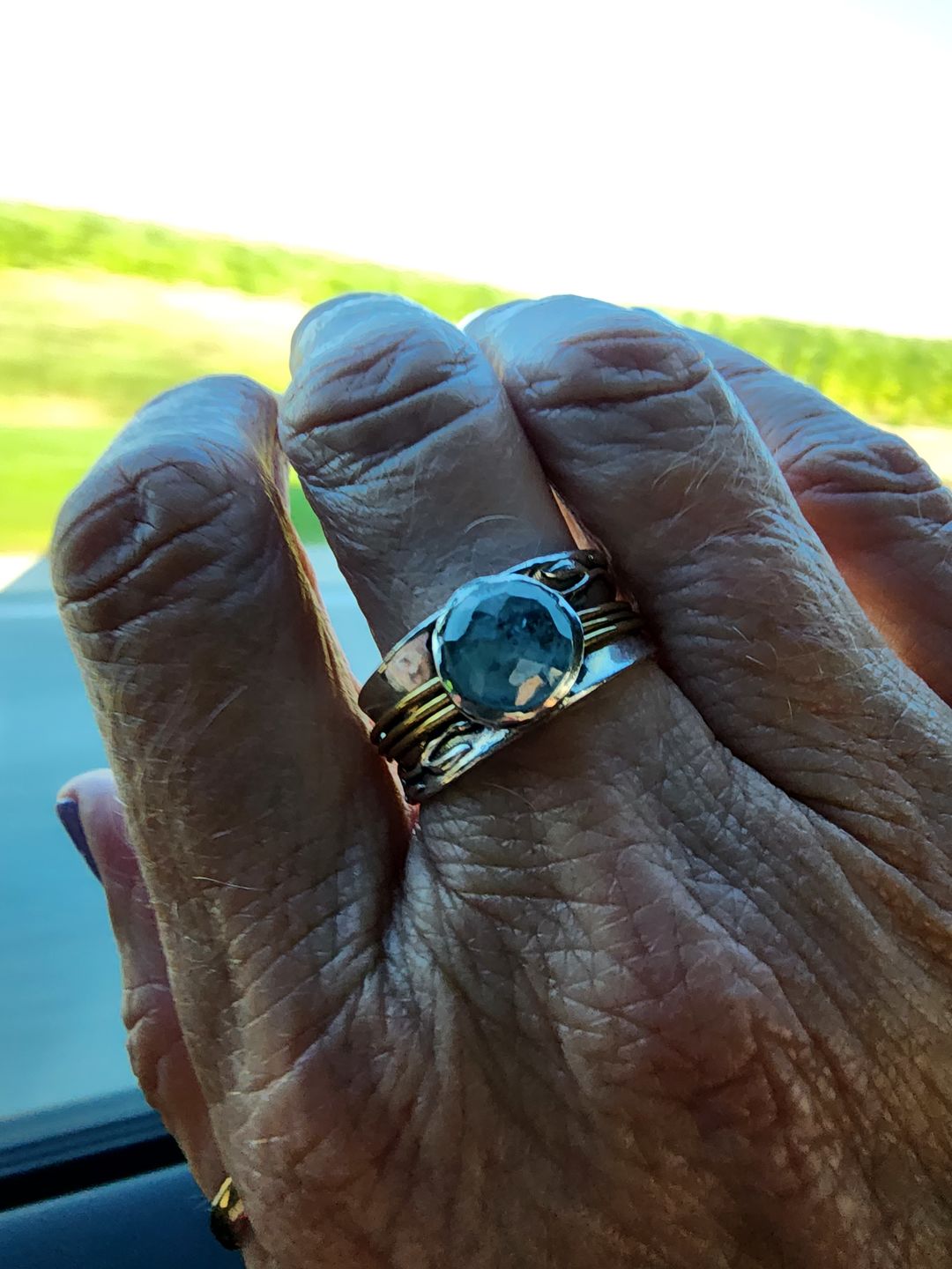 Customer photo review of Aquamarine Spinner Ring Inspired by Nature Sterling Silver