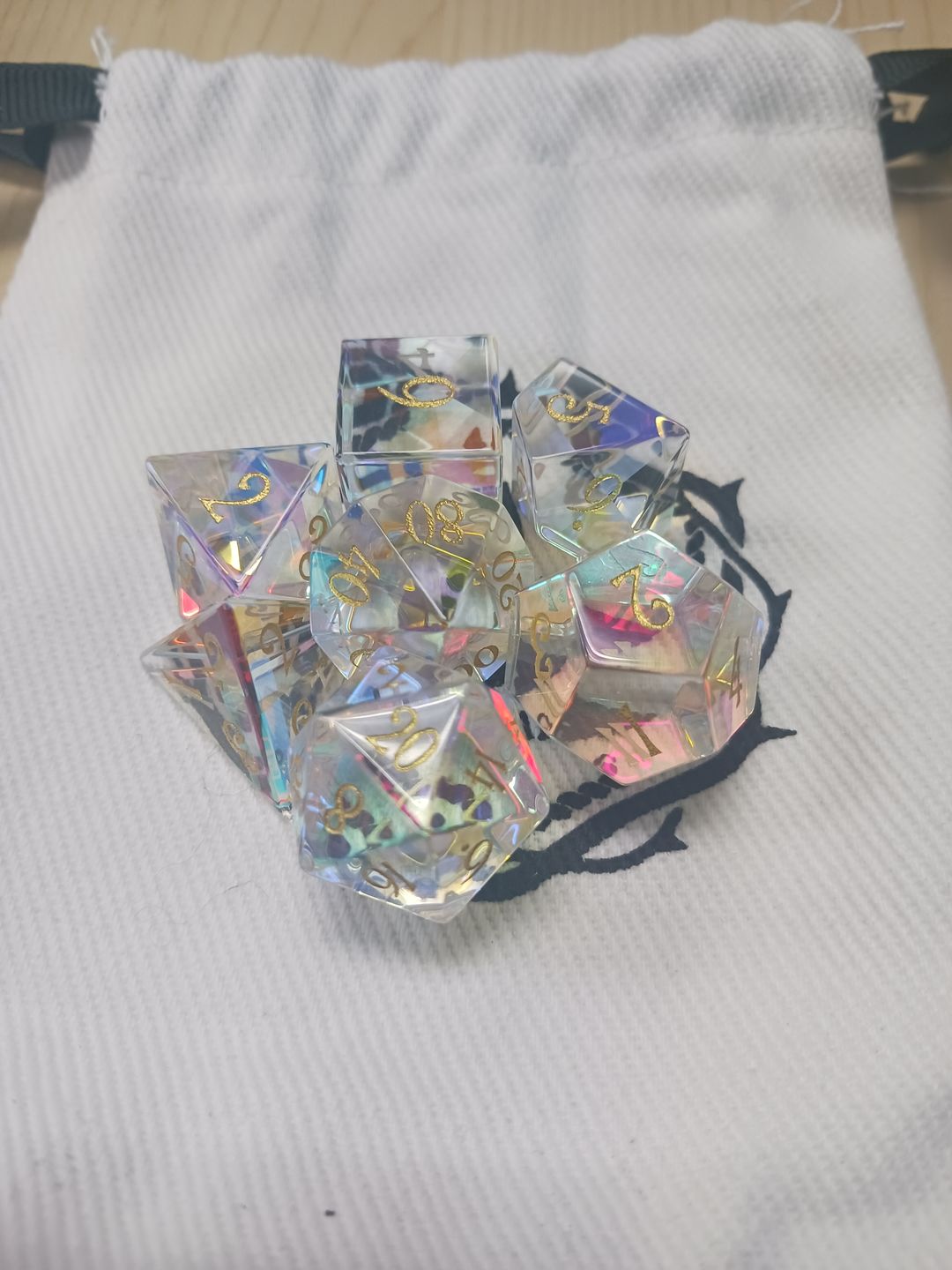 Customer photo review of URWizards D&D Dichroic Prism Glass Gemstone Engraved Dice Set