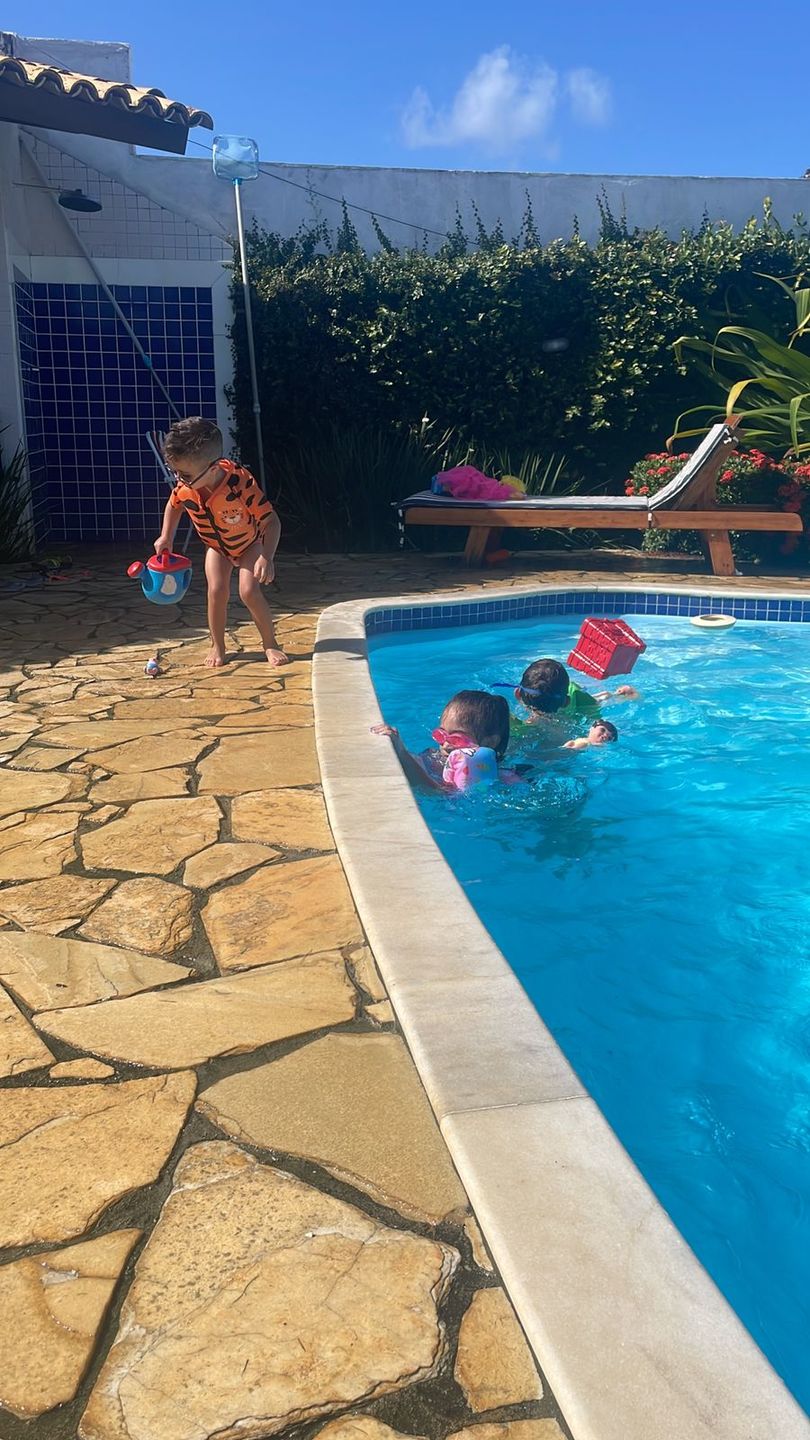 Customer photo review of Camisa Flutuadora Infantil Floater