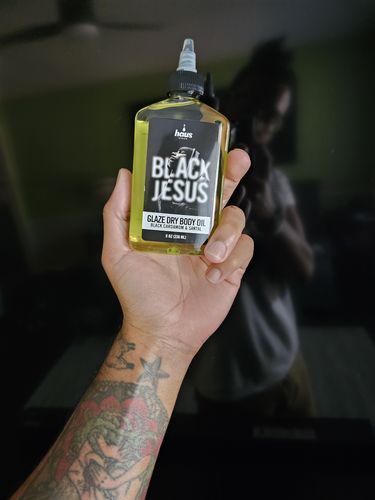 Customer photo review of BLACK JESUS GLAZE DRY BODY OIL | BLACK CARDAMOM & SANTAL