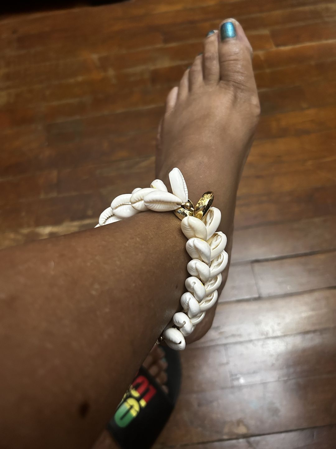 Customer photo review of Cowry cluster bracelet/anklet