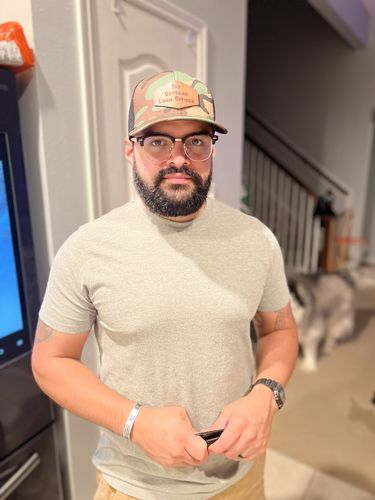 Customer photo review of Custom Leather Patch Trucker Hat - Richardson 112P