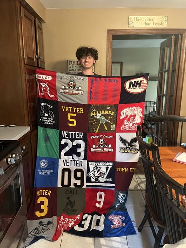 T-shirt quilt with hockey, sports themes by Jennifer from NY
