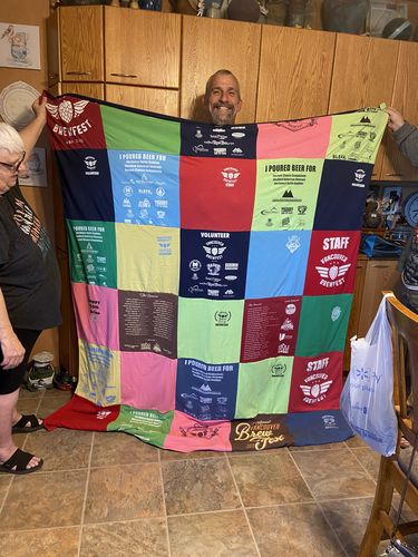 T-shirt quilt with beer festivals, volunteering themes by Shannon from MT