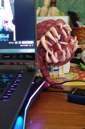 Customer photo review of The GTFO Baby Striker Plushie