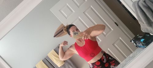Customer photo review of Salty Savage Ladies “OG Smile” Laser Cut Seamless Sports Bra | Bright Red
