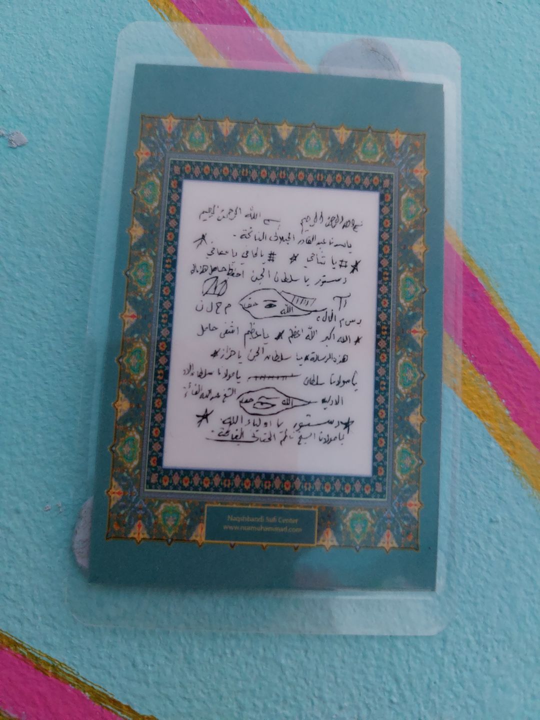 Customer photo review of Laminated Taweezes Pocket Wallet Small (1.5" x 2")