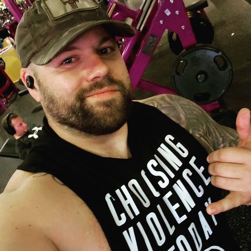 Customer photo review of Salty Savage Unisex “CHOOSING VIOLENCE TODAY” Sleeveless Muscle Tank Hoodie | In Your Face | Black/White