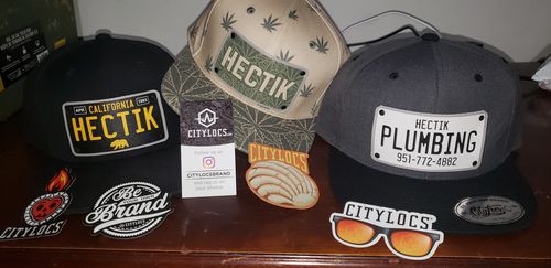 Customer photo review of Black & White Universal License Plate Hat