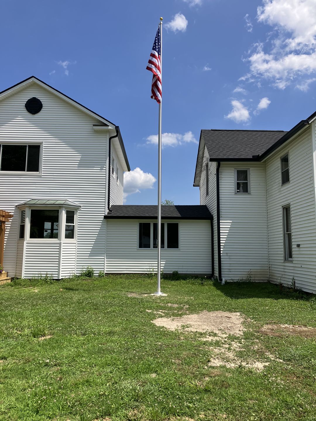 Customer photo review of 30 ft. Commercial Flagpole with External Rope Halyard Rated At 88 mph