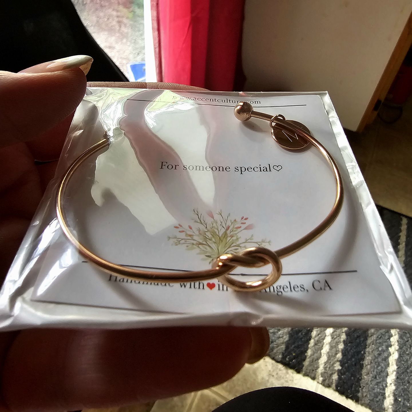 Customer photo review of AC "Tie The Knot" Coin Initial Bracelet
