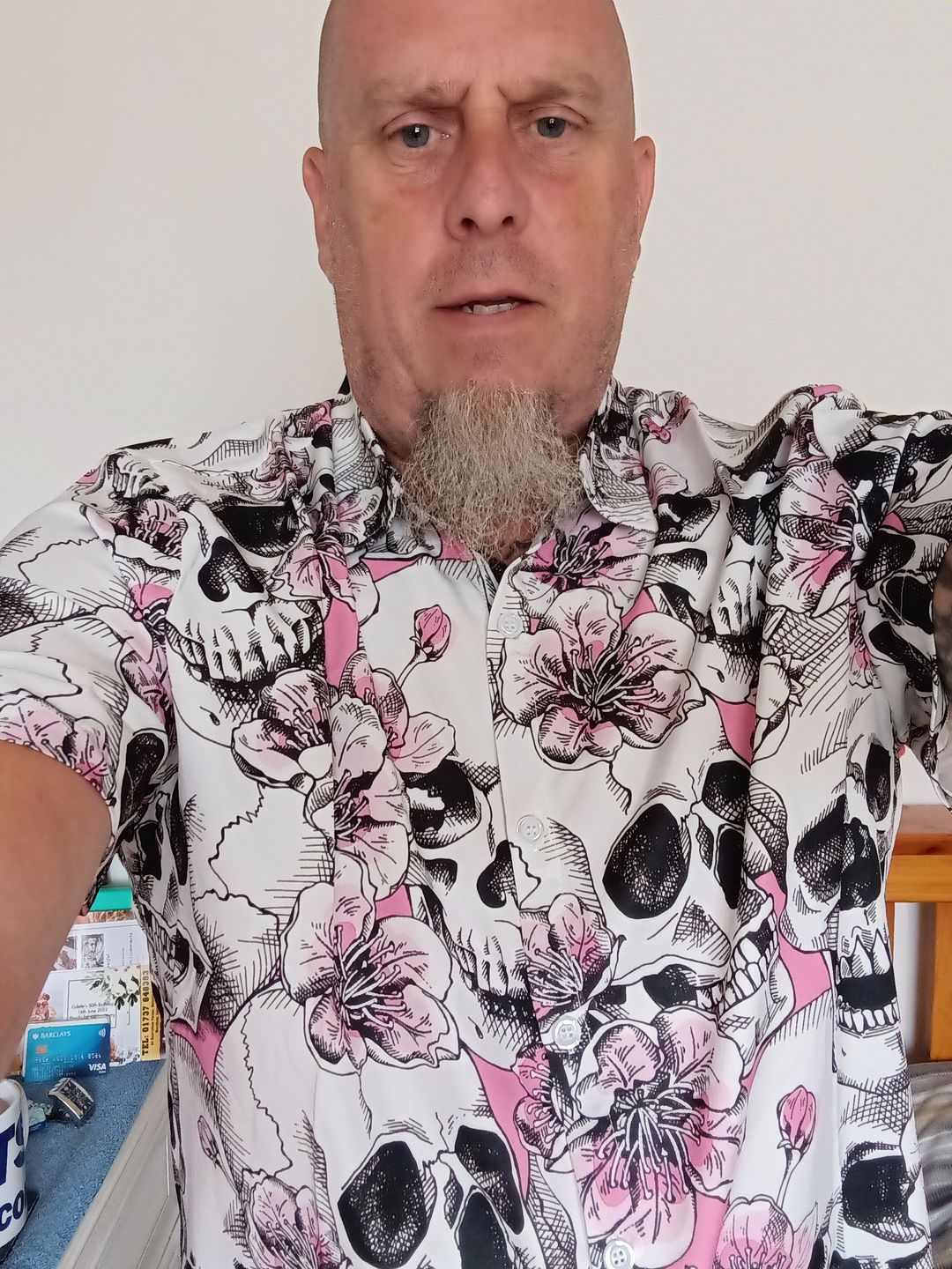 Customer photo review of Men's Skull Pink Flowers Button Up Short Sleeve Shirts