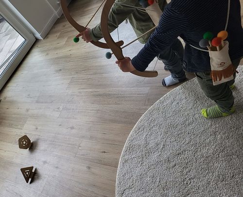 Customer photo review of Pfeil und Bogen Kinder Holzspielzeug mit 5 Pfeilen, Köcher und 3 Zielscheiben
