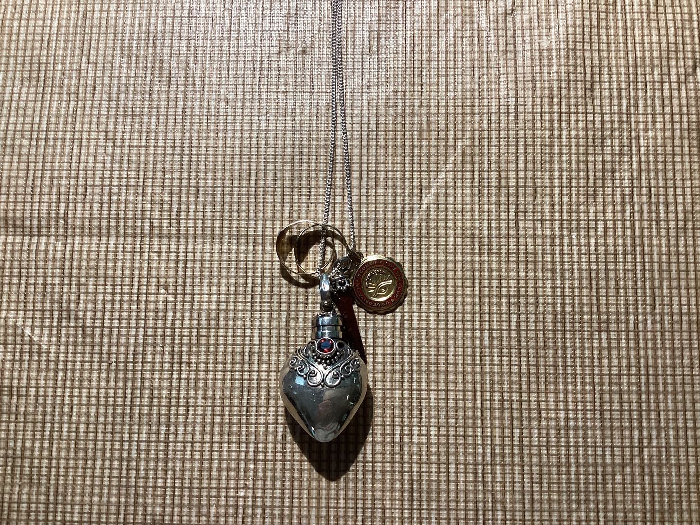 Customer photo review of Garnet Silver Heart Memorial Necklace with Red Tiger Eye Pendant