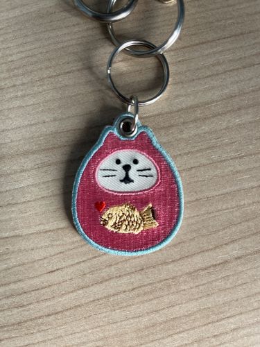 Customer photo review of Keychain Emb. TAIYAKI CAT Daruma