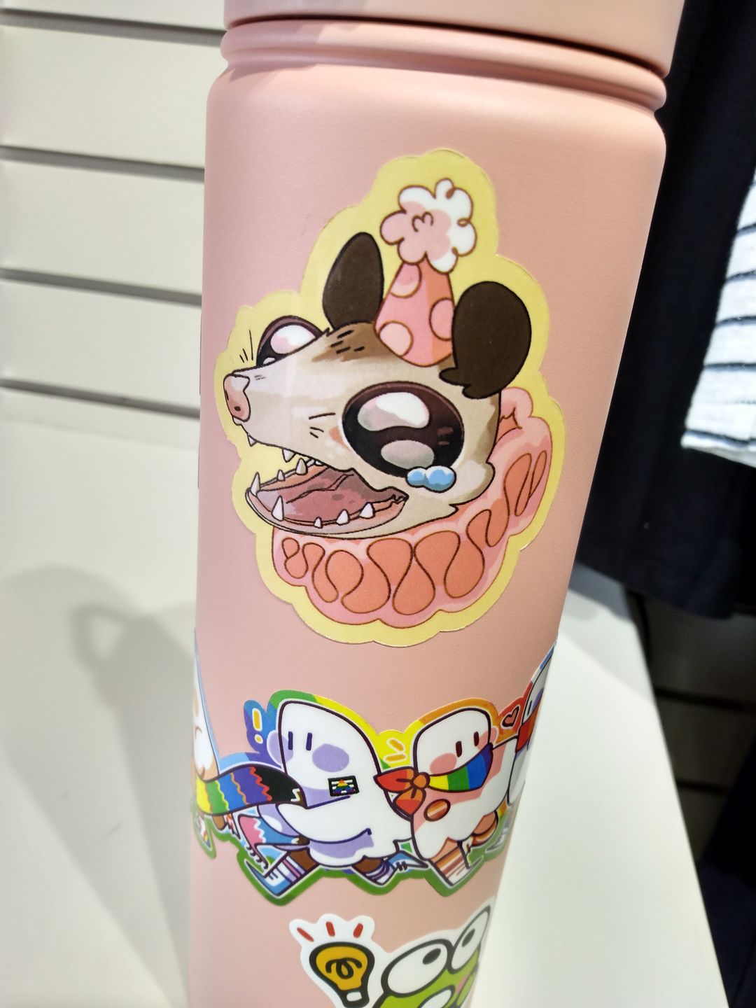 Customer photo review of Sad Party Opossum Stickers!