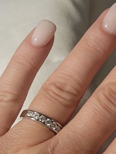 Customer photo review of Channel Set Moissanite Half Eternity Wedding Band Ring In Sterling Silver