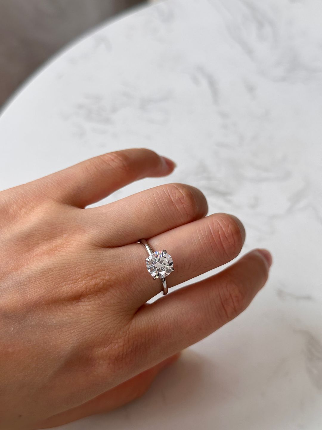 Customer photo review of Louily Classic Round Cut Engagement Ring For Women In Sterling Silver