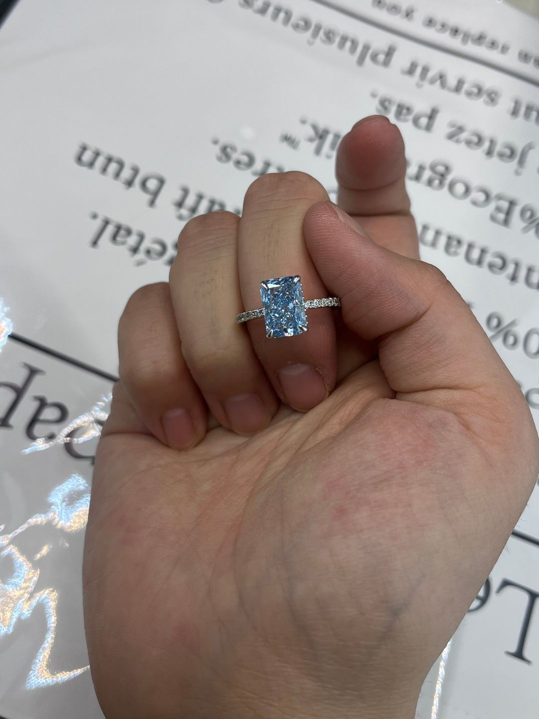 Customer photo review of Louily Exclusive Radiant Cut Light Aquamarine Blue Engagement Ring In Sterling Silver