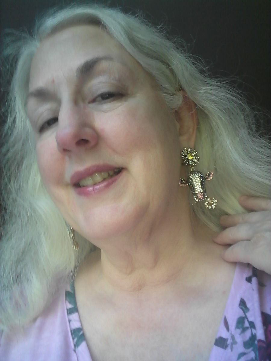 Customer photo review of HEIDI DAUS®"Miss Daisy" Crystal Floral Cow Earrings