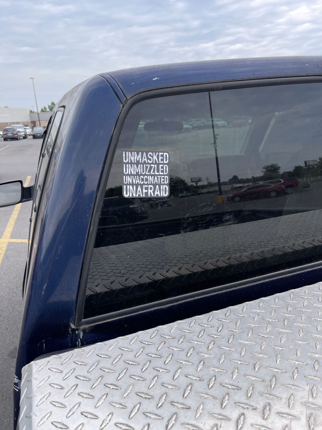 Customer photo review of Unmasked Unmuzzled Decal