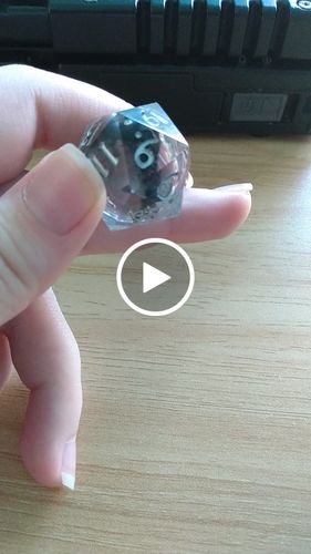 Customer video review of Black Liquid Core Clear Resin DnD D&D Dice Set