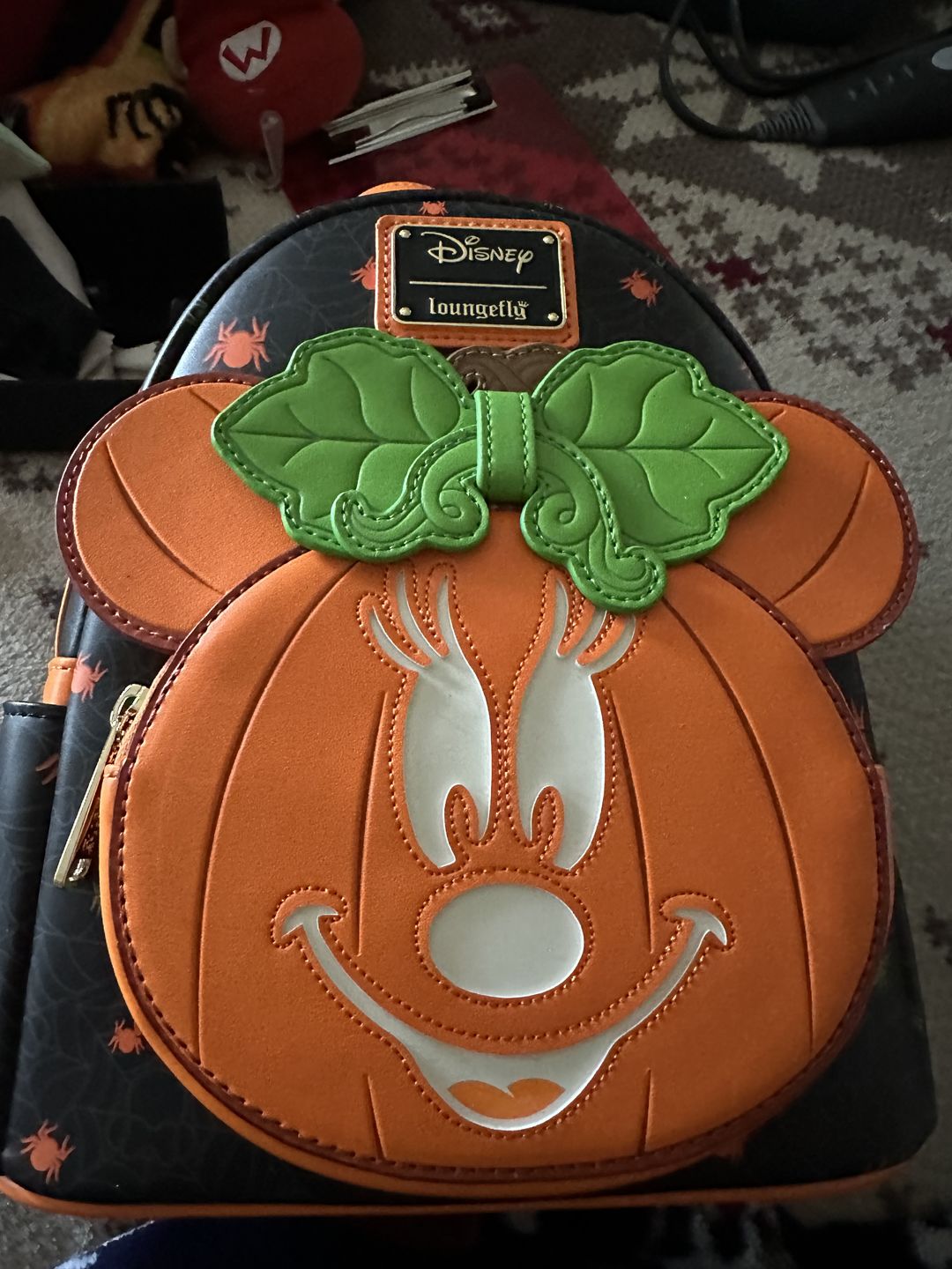 Customer photo review of 707 Street Exclusive - Loungefly Disney Glow in the Dark Pumpkin Minnie Mouse Mini Backpack
