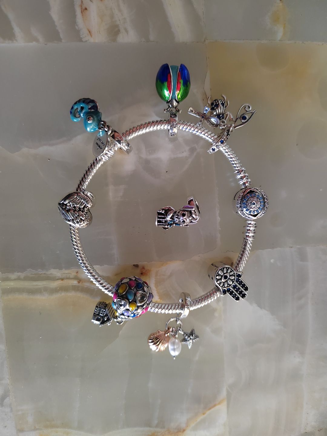 Customer photo review of Charm Conchita de Mar con Perla