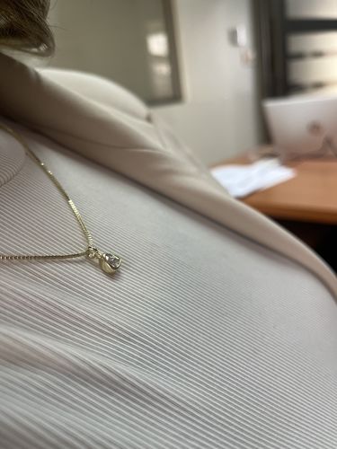Customer photo review of COLLAR WHITE STONE BAÑO DE ORO