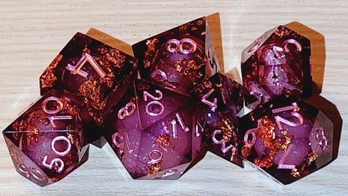 Customer photo review of URWizards D&D Wine Liquid Heart Resin Engraved Dice Set Copper Flakes